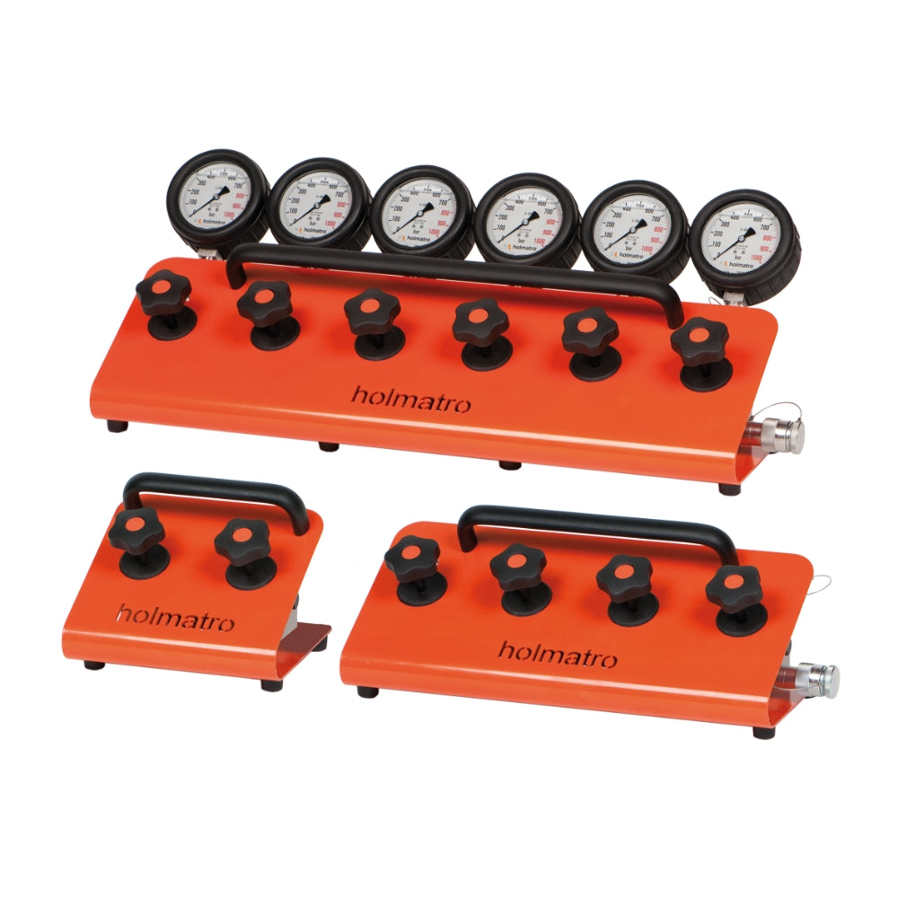 Holmatro manifold med 4 manometre og ventiler, orange base og "holmatro" logo.